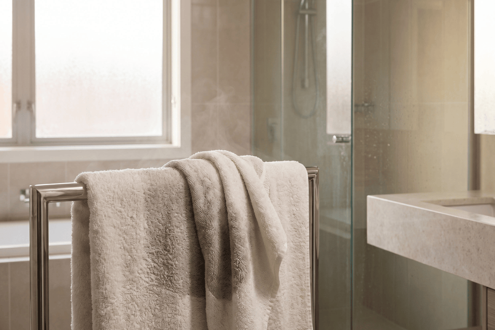 Why Towels Smell: Moisture Retention, Drying Rate and Microbial Growth